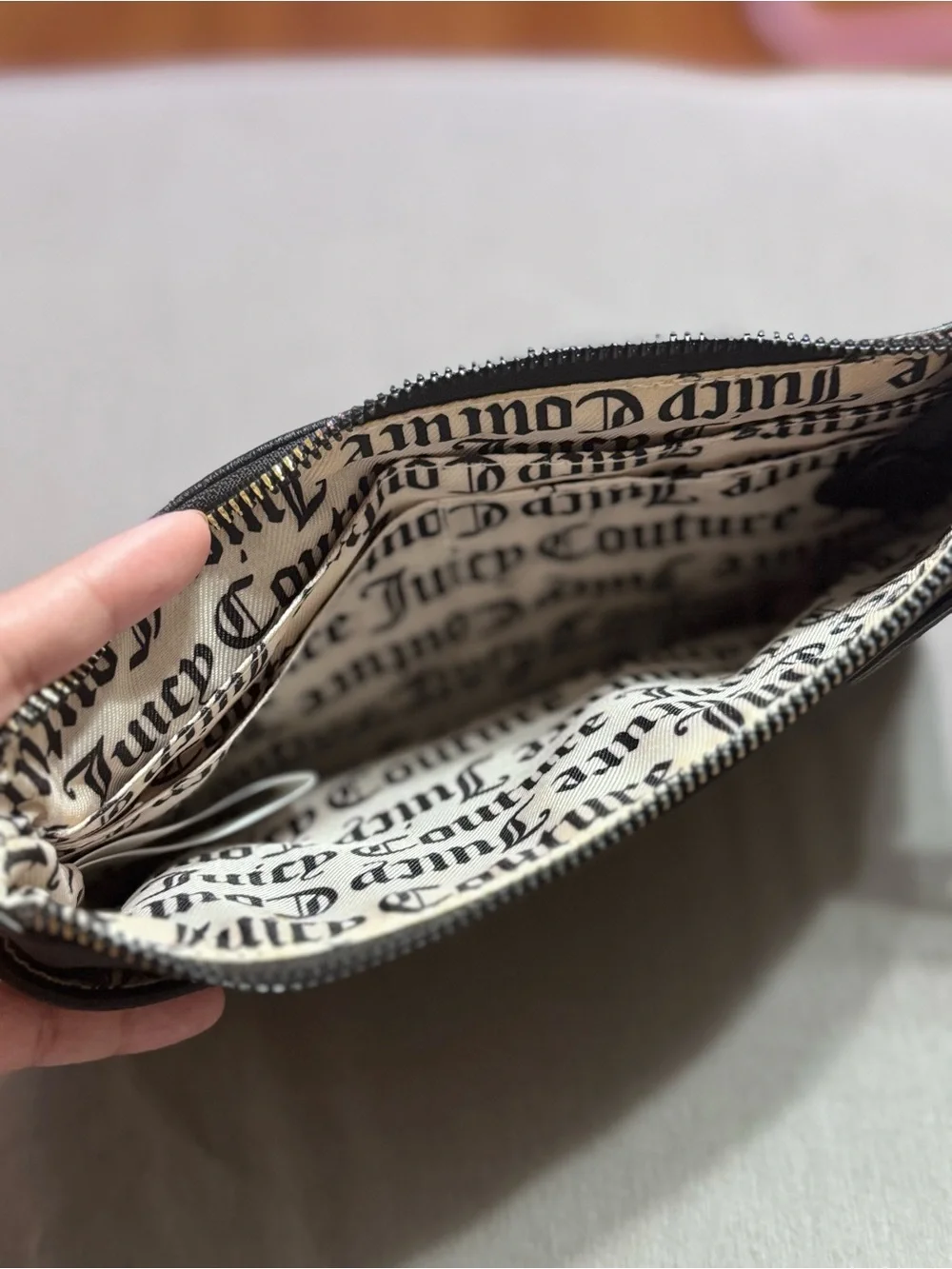 Juicy Couture Black and Beige Logo Wristlet with Gold Crown